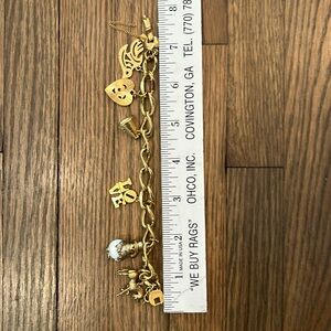 Monet gold (filled) charm bracelet